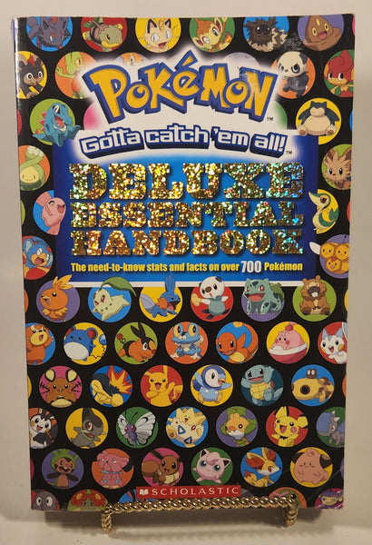 2015 Scholastic Nintendo Creatures Game Freak Pokemon Gotta Catch 'em all! Deluxe Essential Handbook Paperback Book