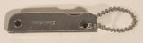 Vintage Bassett Trim Trio Knife Nailfile Bottle Opener Multi Tool Keychain