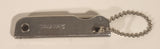 Vintage Bassett Trim Trio Knife Nailfile Bottle Opener Multi Tool Keychain