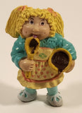 Vintage 1984 OAA Cabbage Patch Kids Girl in Yellow Dress Lick Spoon Holding Bowl 2 3/8" PVC Toy Figure