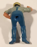 Vintage Sitting Farmer in Blue Overalls 1 3/4" PVC Toy Figure