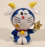 Doraemon Sitting Holding Gold Star 1 3/4" PVC Toy Figure