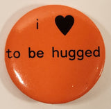 I Love To Be Hugged Orange 1 1/2" Round Button Pin