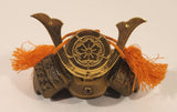Vintage Japanese Cast Iron Bronze Look Samurai Helmet with Orange Tassels Paperweight