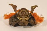 Vintage Japanese Cast Iron Bronze Look Samurai Helmet with Orange Tassels Paperweight