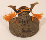 Vintage Japanese Cast Iron Bronze Look Samurai Helmet with Orange Tassels Paperweight