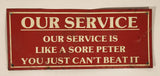 1991 Desperate Sign Co. Our Service Is Like A Sore Peter You Just Can't Beat It Red and White 3" x 7 1/4" Tin Metal Joke Sign