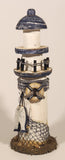 White and Blue Lighthouse with Fish and Fishing Nets Hanging 8 1/2" Wood Ornament
