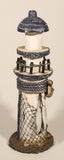White and Blue Lighthouse with Fish and Fishing Nets Hanging 8 1/2" Wood Ornament
