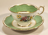 Vintage Crown Fine Bone China Staffordshire England Mixed Flower Pattern Green and White Gold Trim Tea Cup Saucer