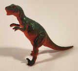 S.H. Orange and Green Raptor 2 3/4" Tall Dinosaur Toy Figure