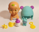 Baby Buppies Giggling Cooing Baby Sounds 3" Plastic Toy Figure with Accessories in Rocking Soother Bottle
