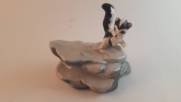 Vintage Porcelain Skunk on a Rock Figurine - Treasure Valley Antiques & Collectibles