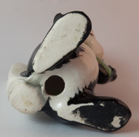 1950s Blushing Skunk with Green Polka Dot Bow Tie - Treasure Valley Antiques & Collectibles
