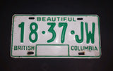 c. 1986 Beautiful British Columbia White with Green Letters Vehicle License Plate 18 37 JW - Treasure Valley Antiques & Collectibles