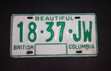 c. 1986 Beautiful British Columbia White with Green Letters Vehicle License Plate 18 37 JW - Treasure Valley Antiques & Collectibles