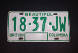 c. 1986 Beautiful British Columbia White with Green Letters Vehicle License Plate 18 37 JW - Treasure Valley Antiques & Collectibles