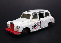1985-1986 Matchbox Mattel Coca-Cola Coke Taxi FX4R with Suicide Doors Diecast Toy Car - Treasure Valley Antiques & Collectibles