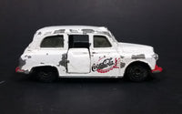 1985-1986 Matchbox Mattel Coca-Cola Coke Taxi FX4R with Suicide Doors Diecast Toy Car - Treasure Valley Antiques & Collectibles