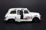 1985-1986 Matchbox Mattel Coca-Cola Coke Taxi FX4R with Suicide Doors Diecast Toy Car - Treasure Valley Antiques & Collectibles