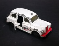 1985-1986 Matchbox Mattel Coca-Cola Coke Taxi FX4R with Suicide Doors Diecast Toy Car - Treasure Valley Antiques & Collectibles