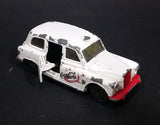 1985-1986 Matchbox Mattel Coca-Cola Coke Taxi FX4R with Suicide Doors Diecast Toy Car - Treasure Valley Antiques & Collectibles