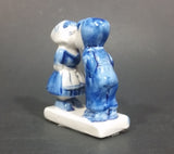 Vintage Delft Blue Holland Dutch Boy and Girl Kissing Hand Painted Ceramic Figurine - Treasure Valley Antiques & Collectibles