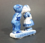 Vintage Delft Blue Holland Dutch Boy and Girl Kissing Hand Painted Ceramic Figurine - Treasure Valley Antiques & Collectibles