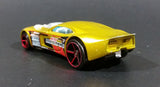 2007 Hot Wheels Nitro Door Slammer Aston Martin Metalflake Gold Die Cast Toy Race Car - Treasure Valley Antiques & Collectibles