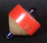 Vintage Orange Black and White Bullseye Solid Wood Spinning Top - Treasure Valley Antiques & Collectibles