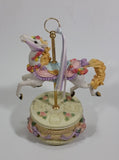 Decorative Carousel Horse on a Cake Music Box - Plays a song with a nice melody - Treasure Valley Antiques & Collectibles