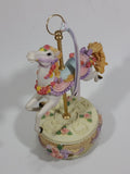 Decorative Carousel Horse on a Cake Music Box - Plays a song with a nice melody - Treasure Valley Antiques & Collectibles