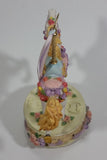 Decorative Carousel Horse on a Cake Music Box - Plays a song with a nice melody - Treasure Valley Antiques & Collectibles