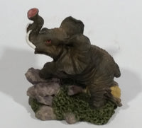 Elephant with Tusks Holding Trunk Upwards Resin Figurine - SABRE - Treasure Valley Antiques & Collectibles