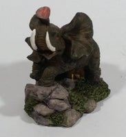 Elephant with Tusks Holding Trunk Upwards Resin Figurine - SABRE - Treasure Valley Antiques & Collectibles