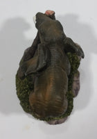 Elephant with Tusks Pulling a Log With It's Trunk Resin Figurine - SABRE - Treasure Valley Antiques & Collectibles
