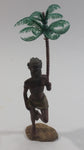 Man Holding a Palm Tree Umbrella While Standing on One Foot Resin and Plastic Figurine