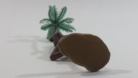 Man Holding a Palm Tree Umbrella While Standing on One Foot Resin and Plastic Figurine