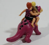 1990s U.C.S. and Amblin Dakin Hanna Barbera The Flintstones Pebbles and Bamm-Bamm Riding Dino PVC Toy Figure Cartoon TV Show Collectible