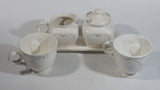 Bombay Company White Embossed Floral Design Creamer, Sugar Bowl, Tea Cup Set