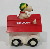 Vintage 1975 Aviva Snoopy Doghouse Motorized Friction Pullback Plastic Toy Car Vehicle