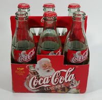 1999 Coca-Cola Classic Soda Pop Limited Edition Santa Claus 6-Pack of Empty 8 oz. Glass Bottles with Paper Carrier (4 Lids)