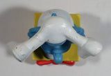 2011 Peyo "Jokey" Smurf Doing a Hand Stand on a Present Gift PVC Toy Figure McDonald's Happy Meal