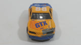Vintage Zee Toys Dyna Wheels Ford Thundebird Stock Car #88 STP GTX D101 Orange and Blue Die Cast Toy Race Car Vehicle