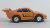 Vintage Good Year Porsche 935 Turbo #3 Orange Pullback Friction Race Car Die Cast Toy Vehicle - Made in Hong Kong