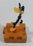 1996 McDonald's Warner Bros Looney Tunes Space Jam Daffy Duck on a Basketball Puzzle Pieces Shaped Plastic Toy Figure