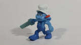 2011 Peyo "Carpenter" Smurf Holding a Saw with a Pencil in His Ear PVC Toy Figure McDonald's Happy Meal