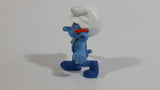 2011 Peyo "Carpenter" Smurf Holding a Saw with a Pencil in His Ear PVC Toy Figure McDonald's Happy Meal