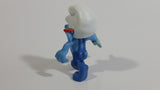2011 Peyo "Carpenter" Smurf Holding a Saw with a Pencil in His Ear PVC Toy Figure McDonald's Happy Meal