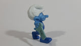 2011 Peyo "Carpenter" Smurf Holding a Saw with a Pencil in His Ear PVC Toy Figure McDonald's Happy Meal